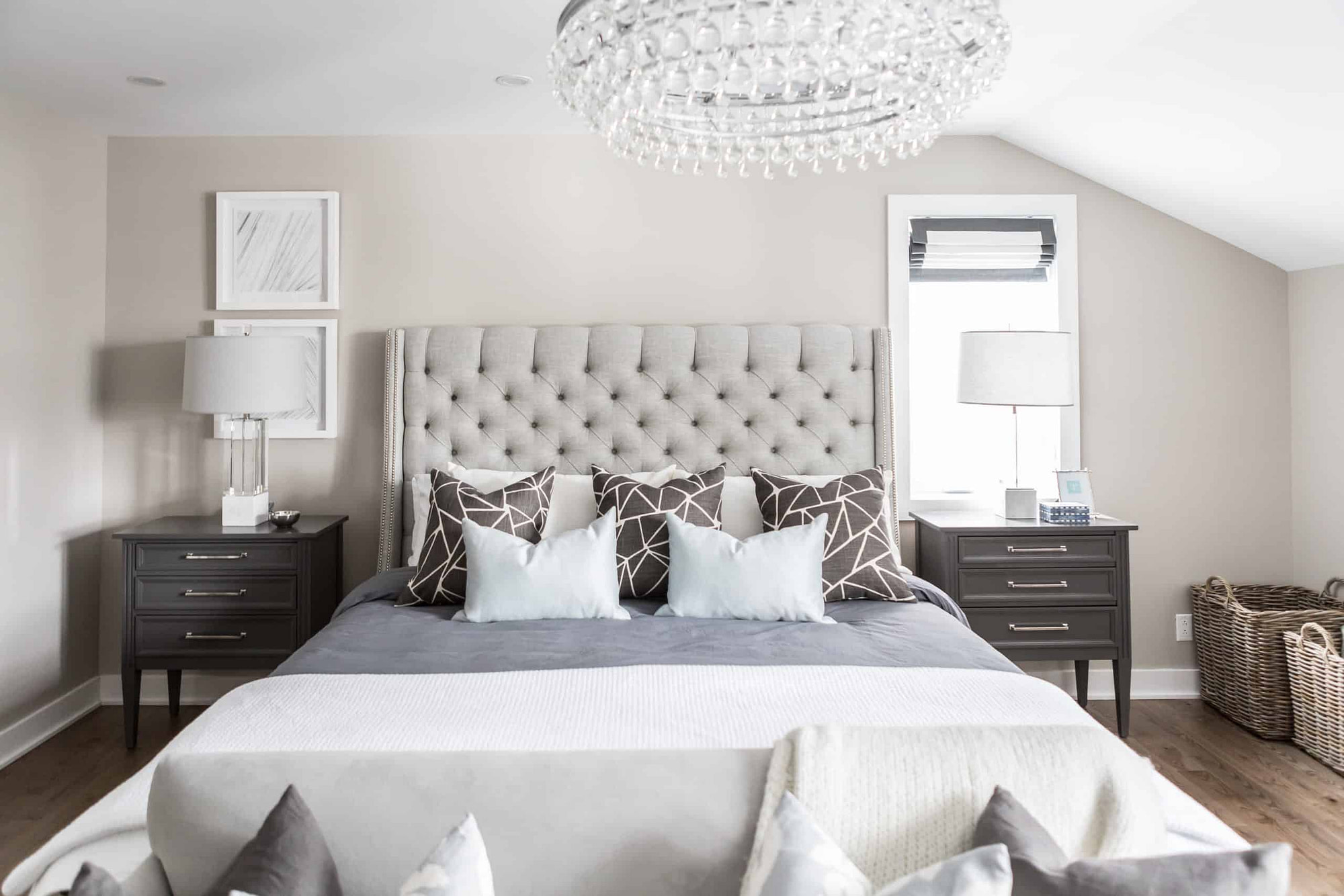 Modern gray bed within a master bedroom