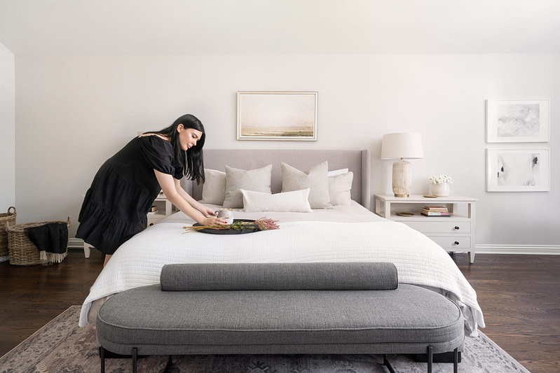 Lara serving breakfast in bed, designed by LUX decor