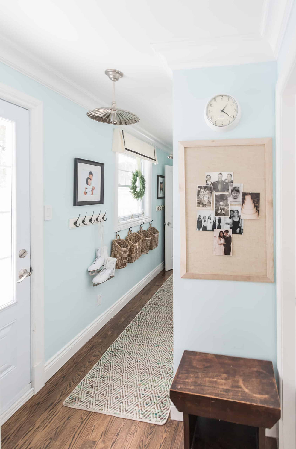 Long hallway with sky blue painted walls
