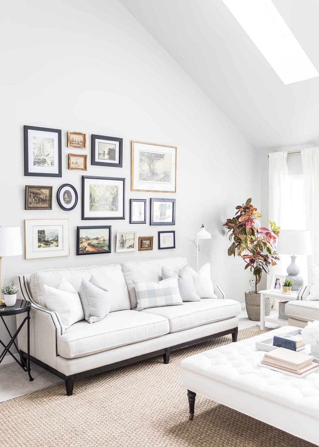 A large amount of pictures above the couch