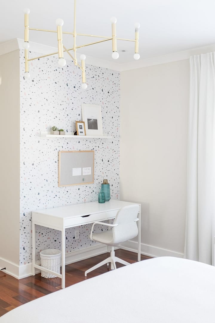 Small office space with a wallpaper on the wall